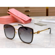 Miu miu Sunglasses